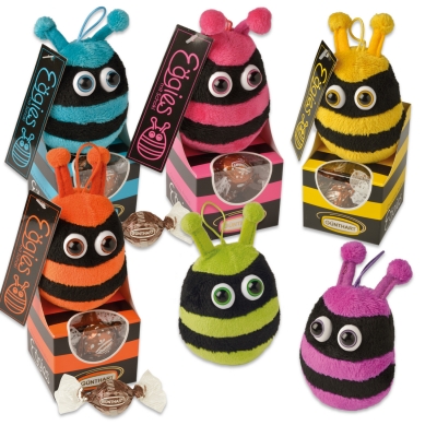 12 St. Plüsch-Eggies auf Box, gefüllt mit feinen Pralinen 